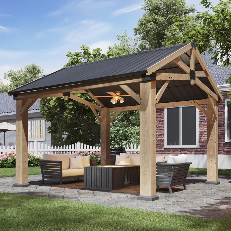 Aoxun cedar pavilion gazebo, gable roof, four posts, on a paved patio by a house