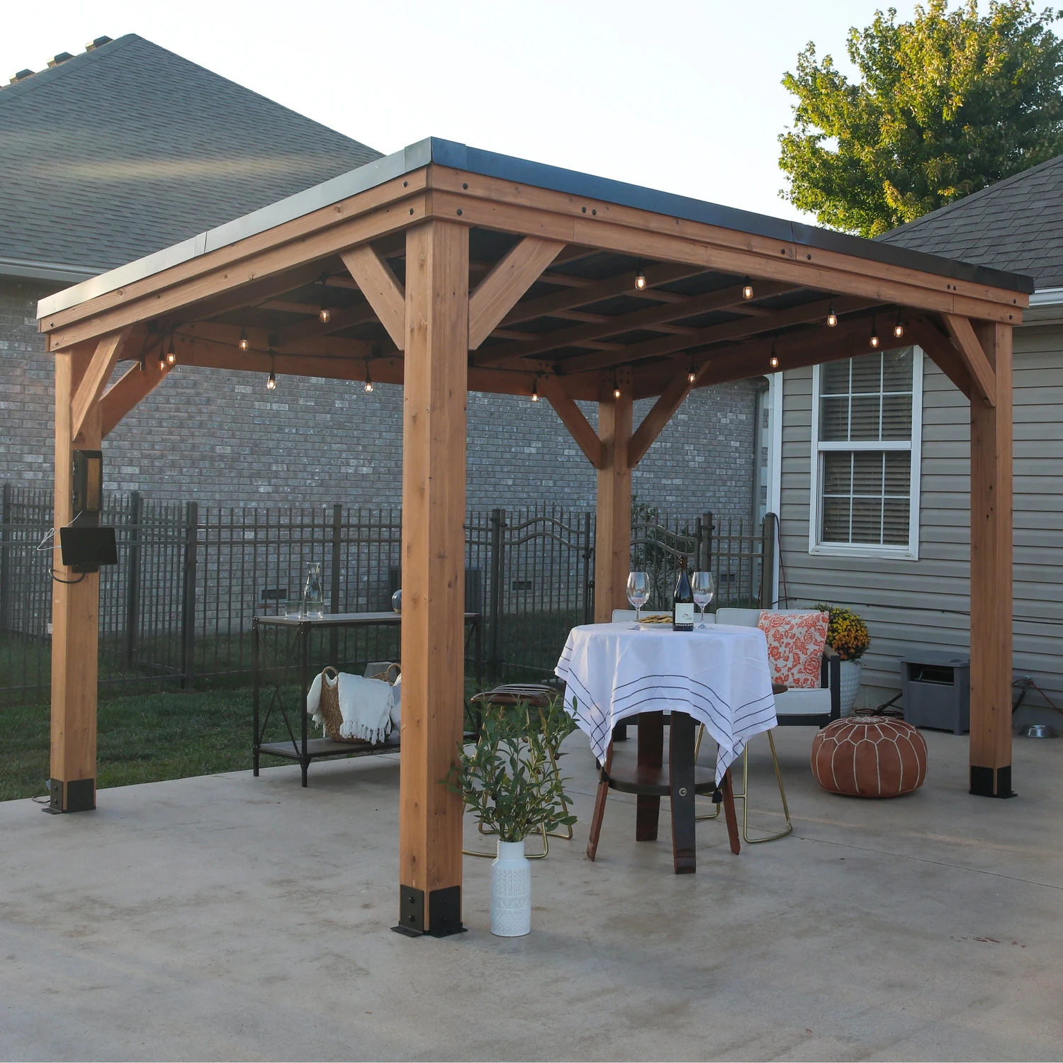 backyard-discovery-12x9-5-arcadia-gazebo-01 Backyard Discovery Arcadia 12x9.5 cedar gazebo with galvanized steel roof over a bistro table