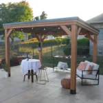 Arcadia 12x9.5 gazebo with string lights over patio seating