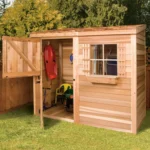 Cedarshed Bayside western red cedar lean-to shed with Dutch door open and gear inside