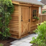 Cedarshed Bayside cedar shed with Dutch door and window planter box against a house